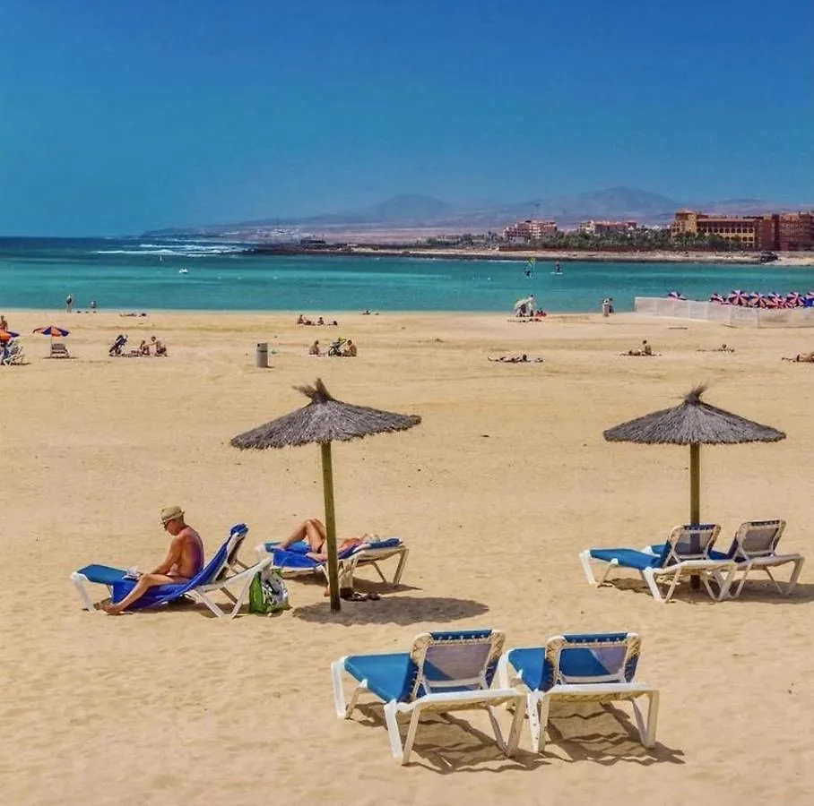 Green View Luxury Apartment: Beachfront Golf Retreat Caleta De Fuste